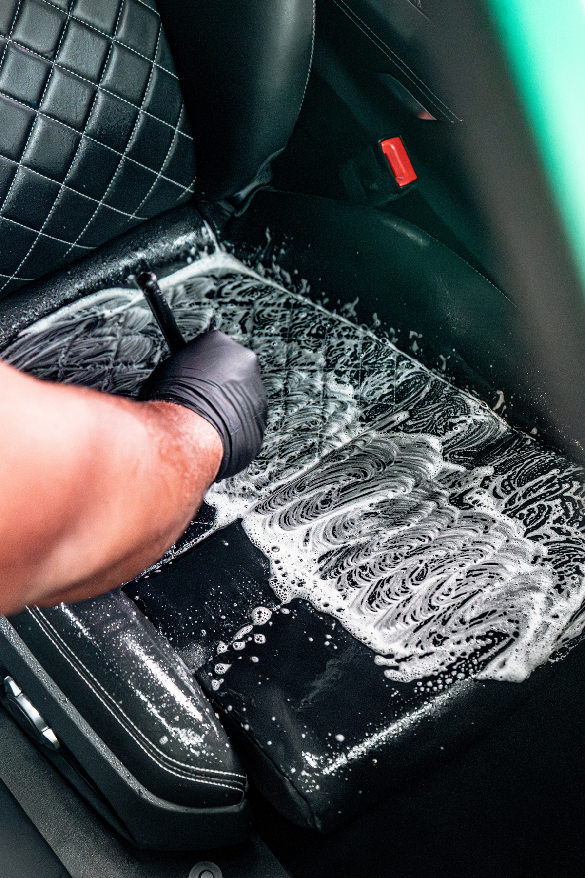 Ultra-soft brush in use on car emblems.