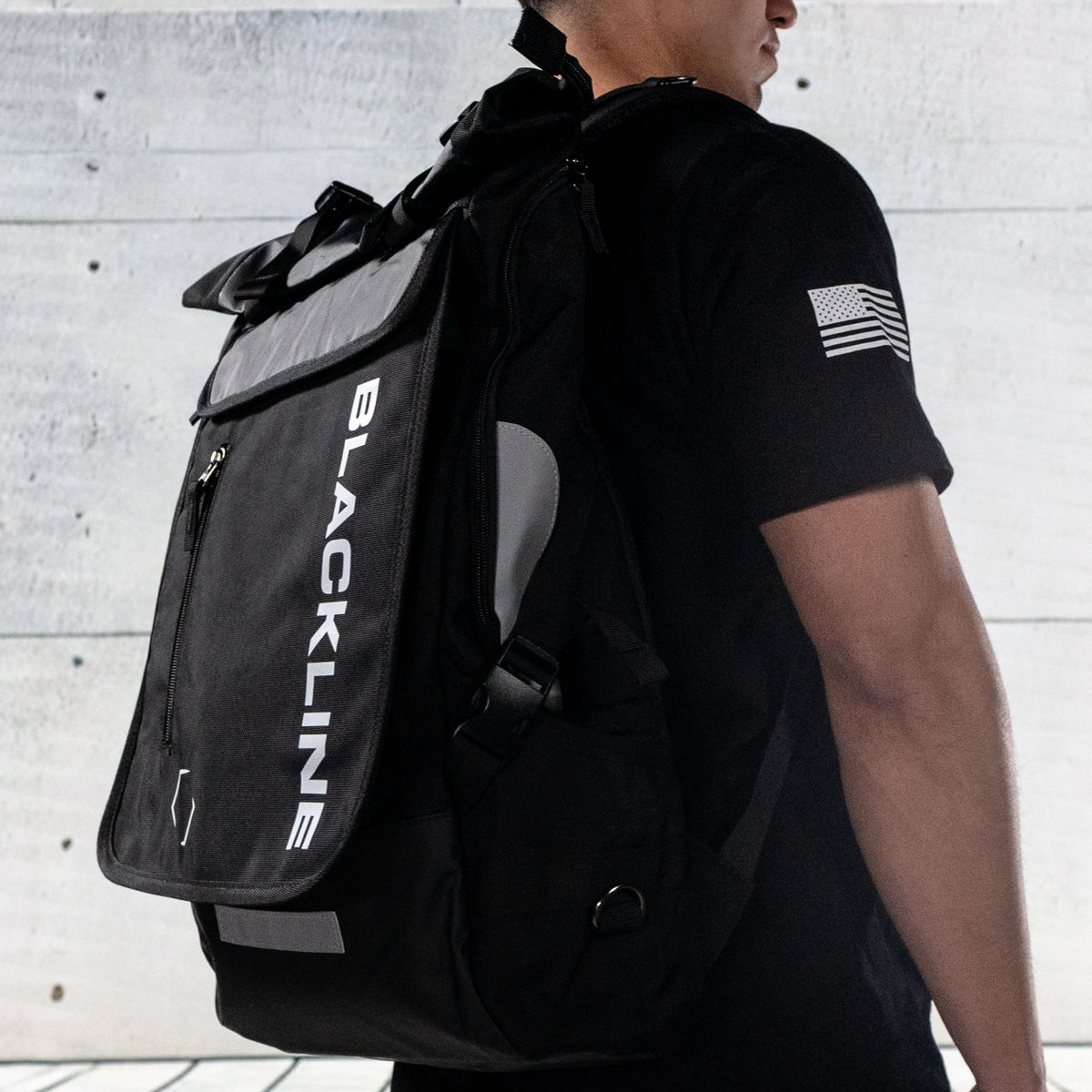 Lifestyle photo of the Blackline Essential Backpack at a detailing job site.