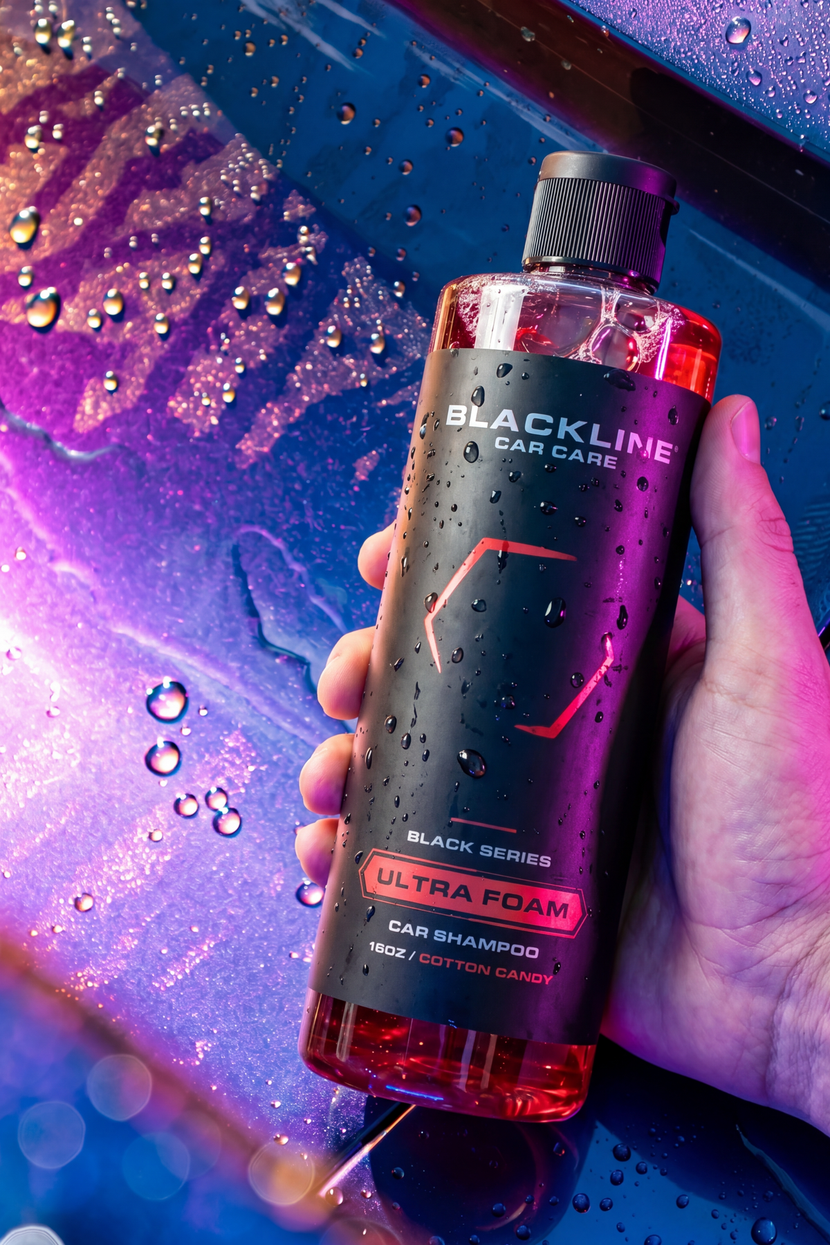 Ultra Foam Cotton Candy 64oz refill bottle being used during a wash.