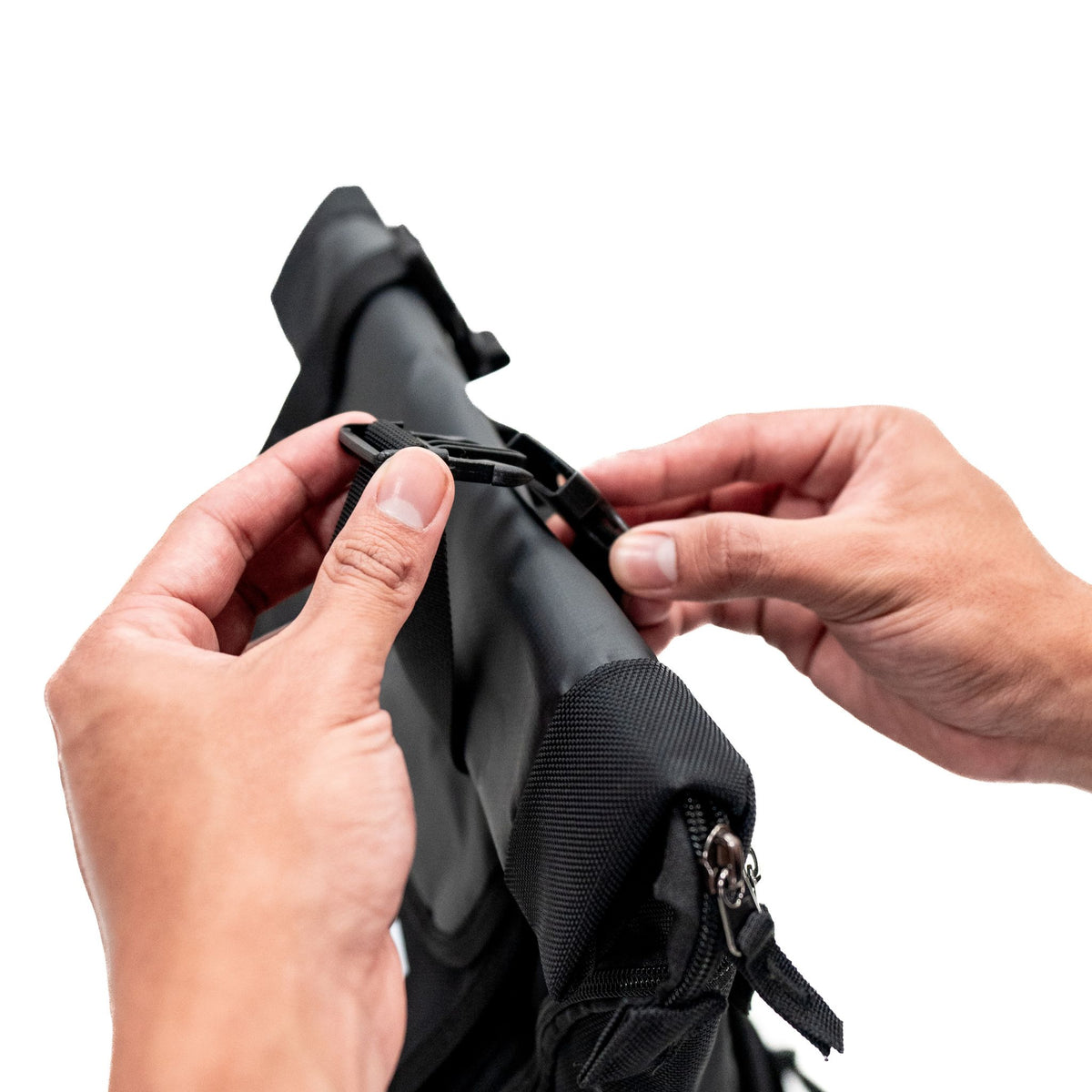 Blackline Essential Backpack with detailing bottles loaded inside.