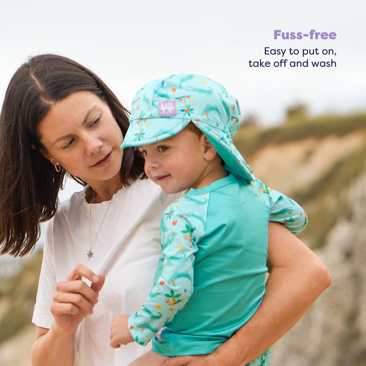 UPF 40+ Reversible Swim Hat for Babies and Toddlers in Crafty Croc - Bambino Mio (EU)