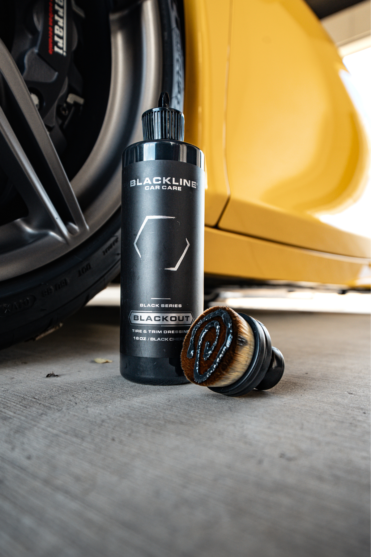 Trim and tire treatment from the Blackout Bundle in use.