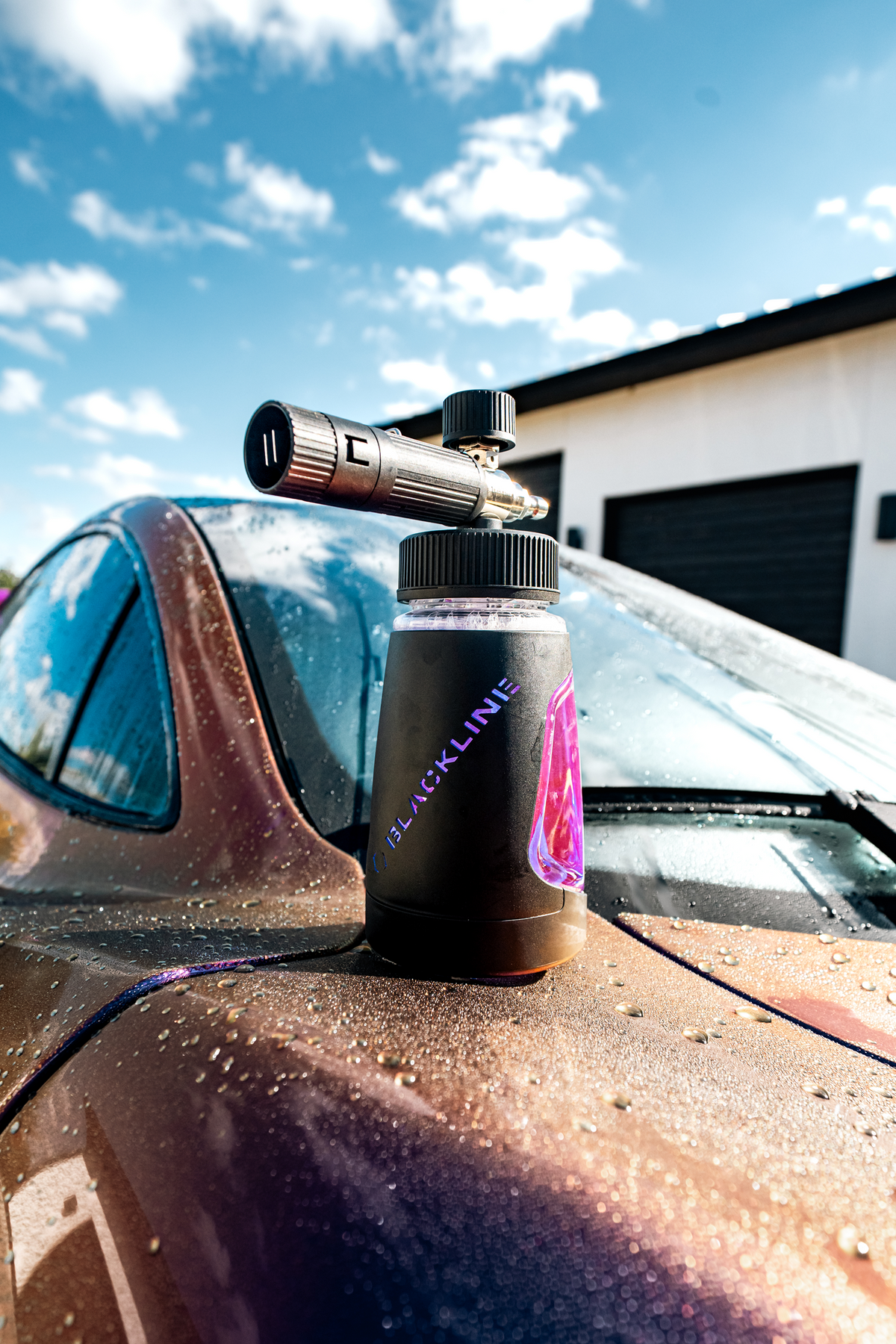 Lifestyle shot of the Ultra Series Foam Cannon in detailing bay.
