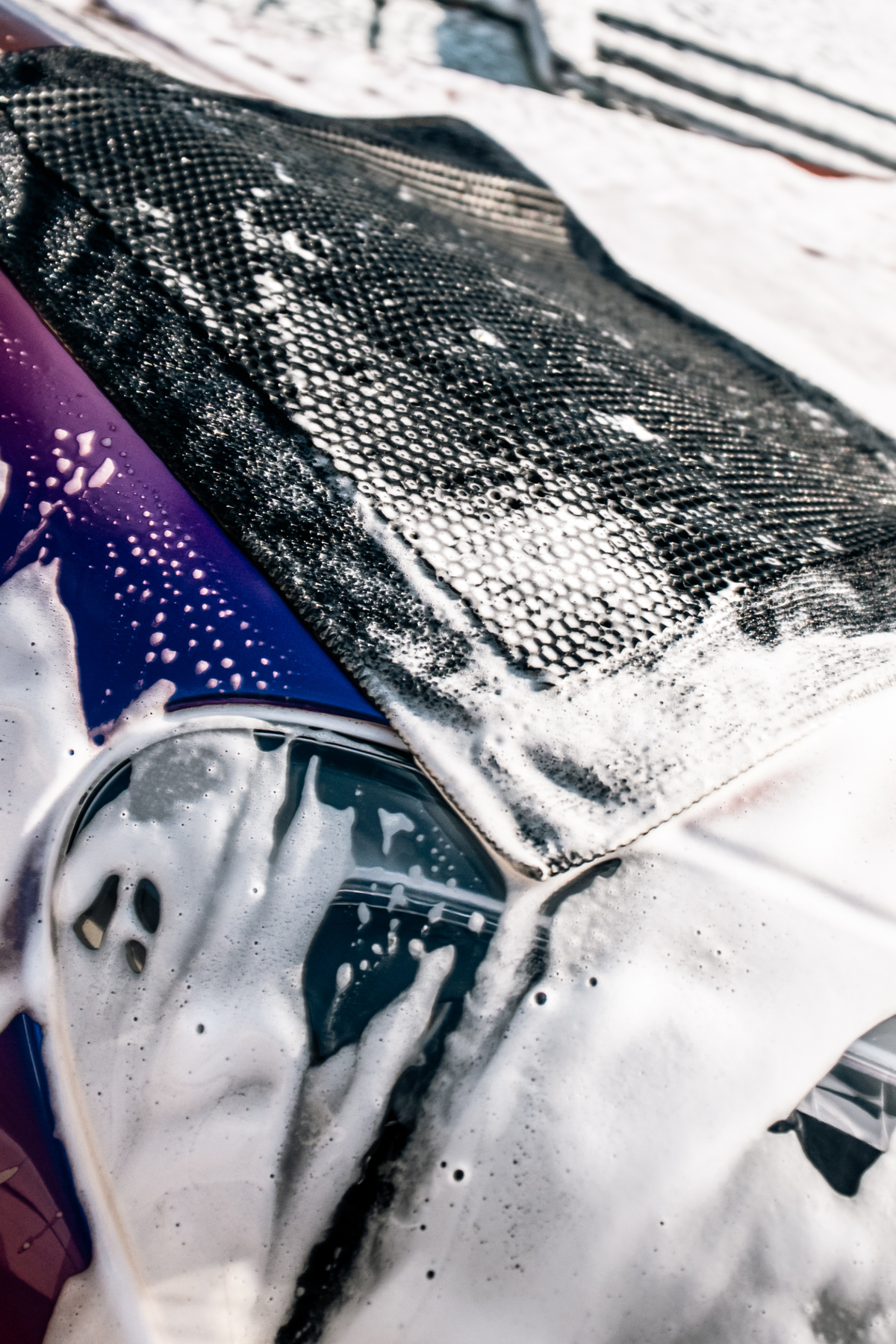 Close-up of the rubber polymer surface on the Blackline Synthetic Clay Towel.