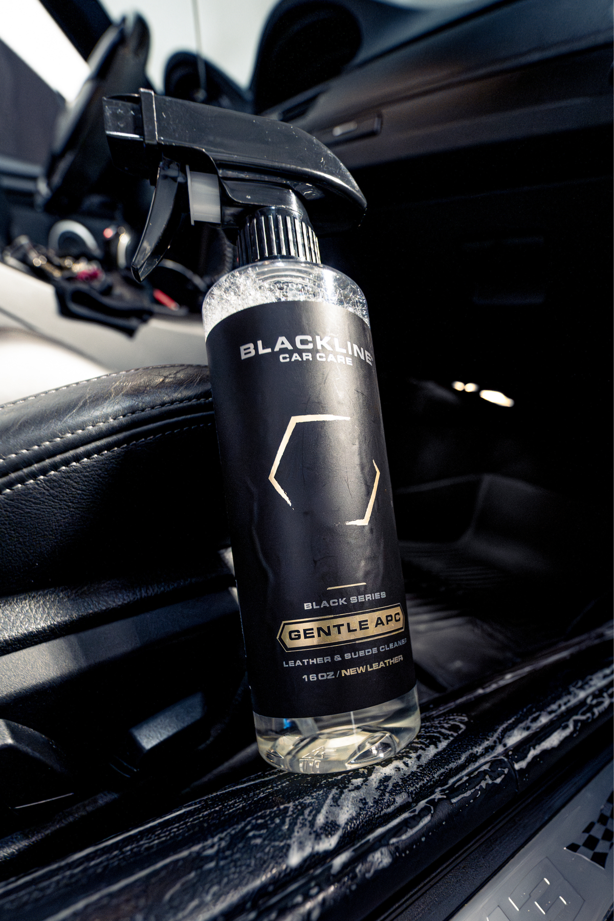 Blackline Gentle APC applied to a car door sill during detailing.