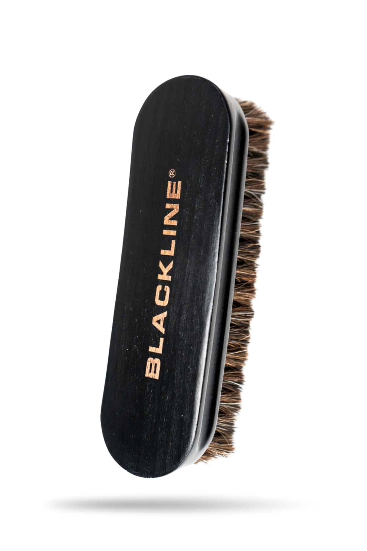 Blackline Leather Brush with soft bristles for cleaning leather interiors.