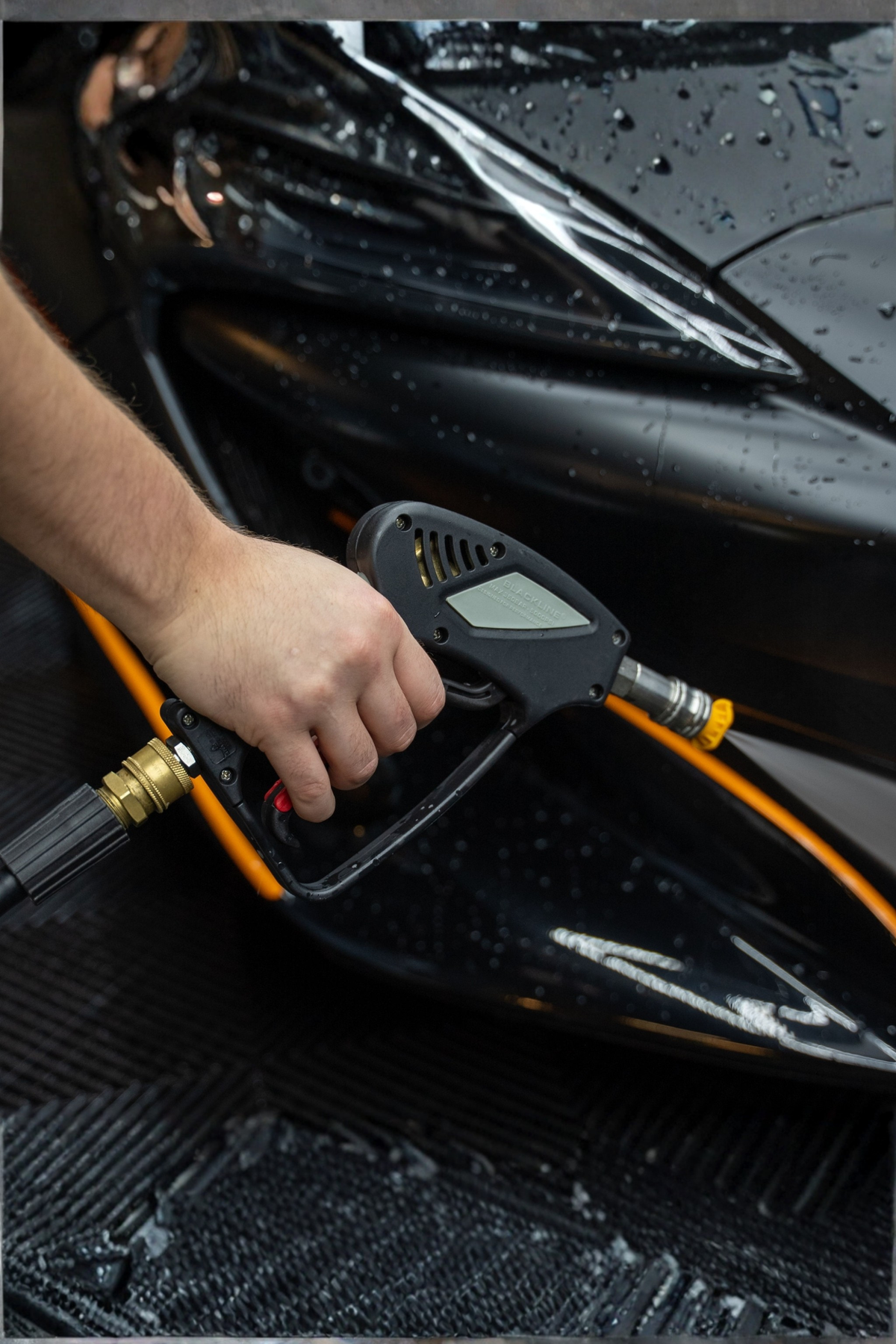 Detail of the Snub-Nose Pressure Washer Gun trigger and nozzle.