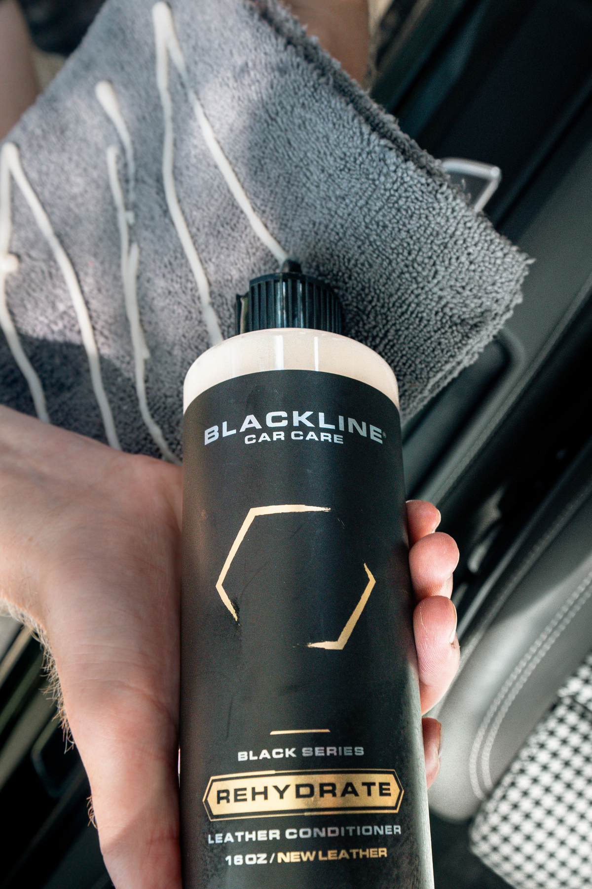 Leather brush from the Blackline Leather Bundle agitating leather.