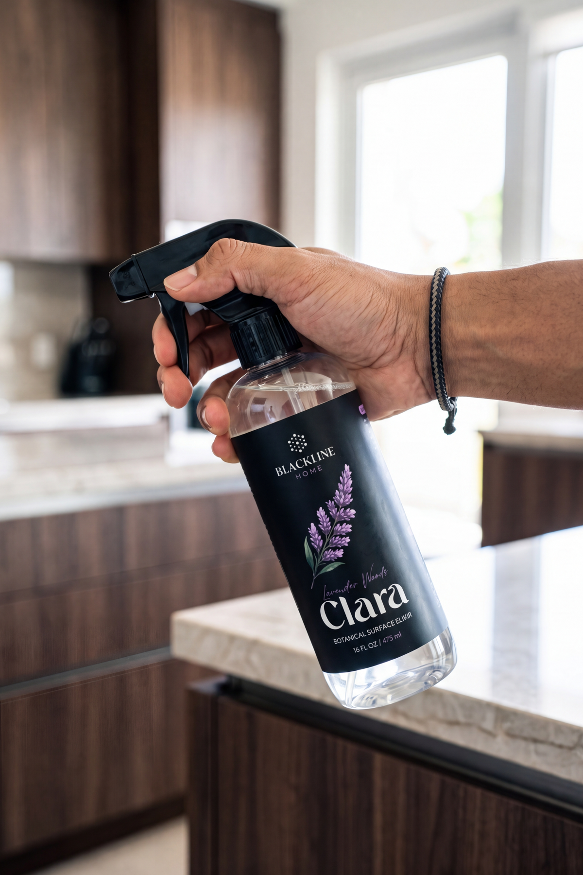 Blackline Home Clara 16oz Boston-round spray bottle, premium plant-based cleaner with botanical scent profiles.