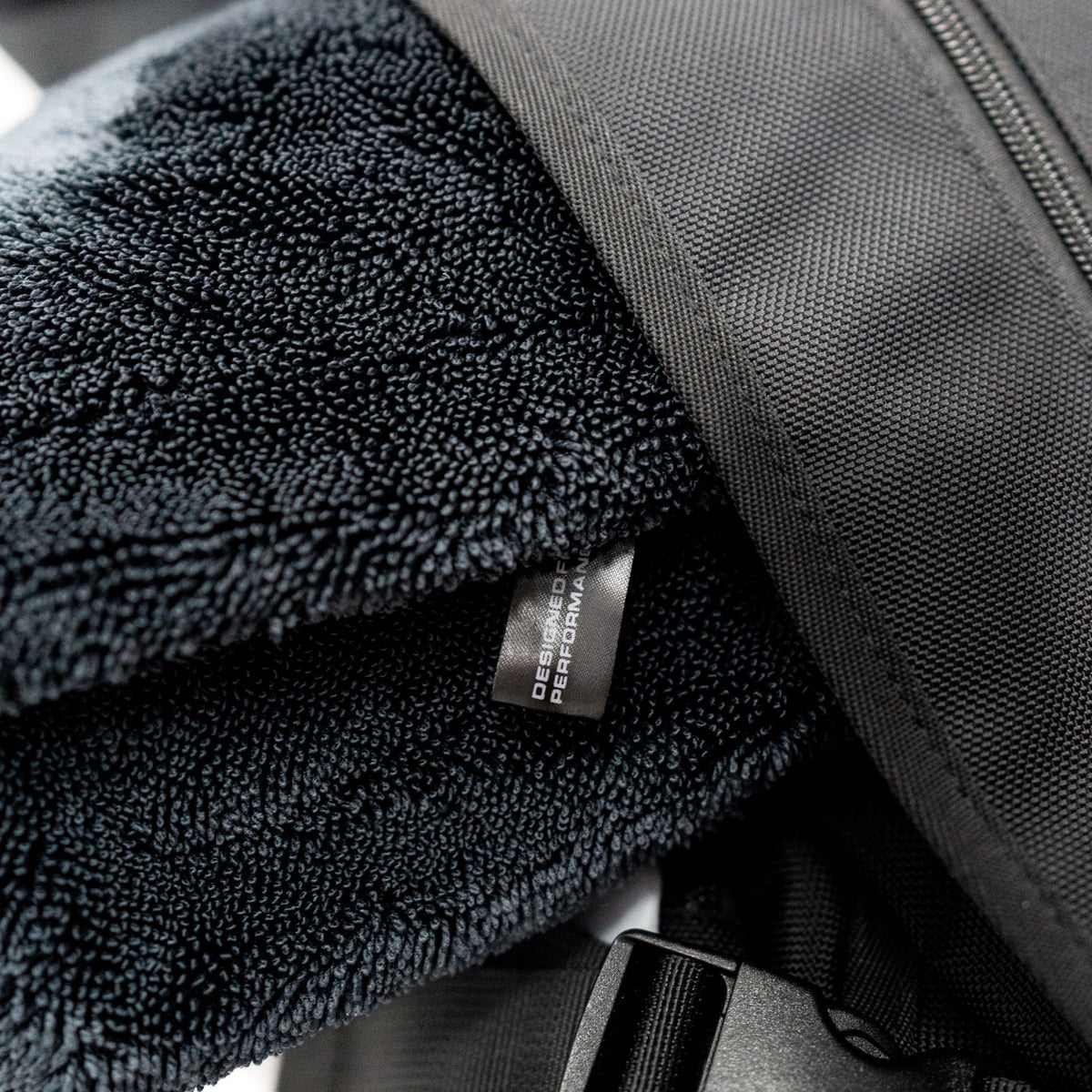 Detail of the Blackline Essential Backpack straps and handles.