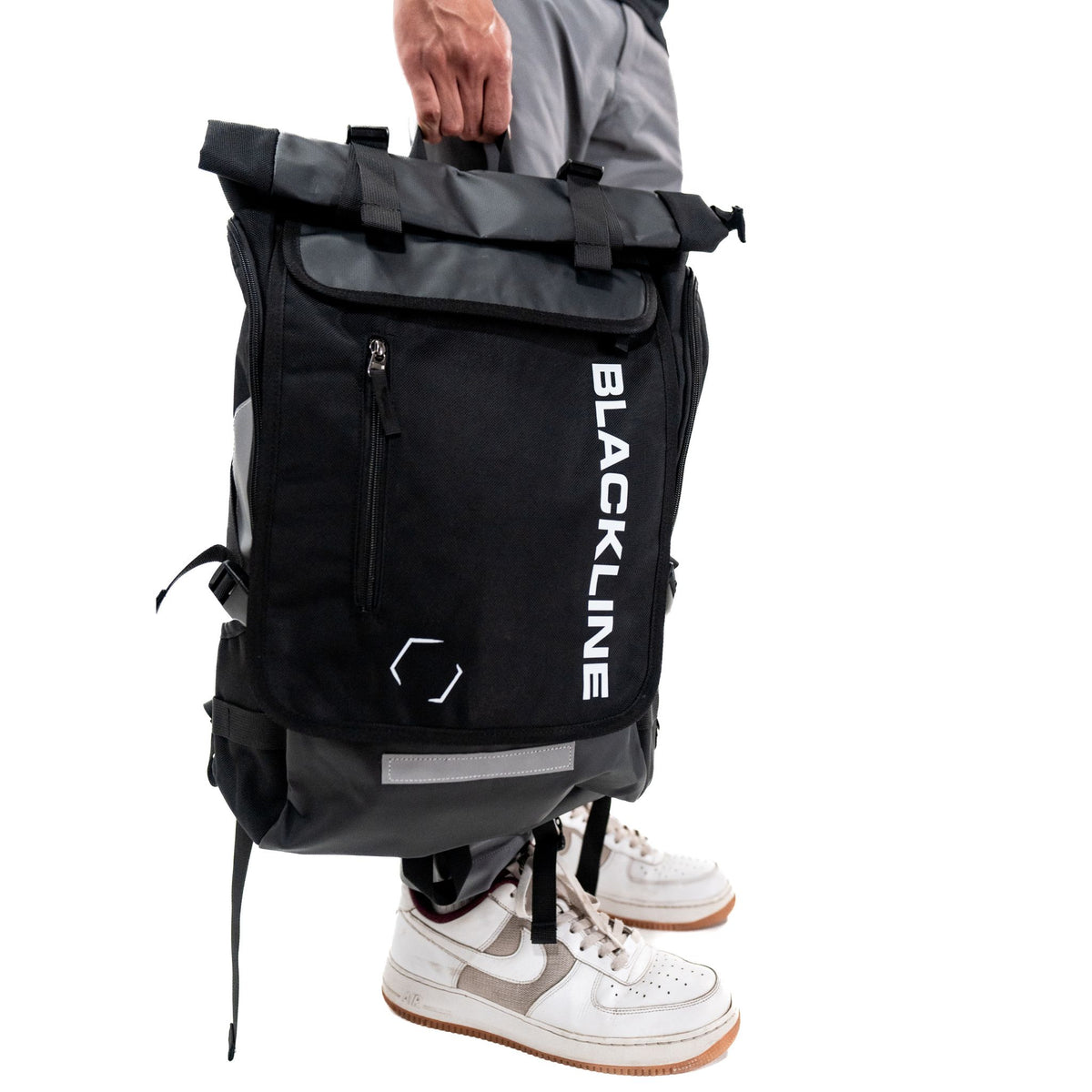 Side view of the Blackline Essential Backpack showing storage pockets.