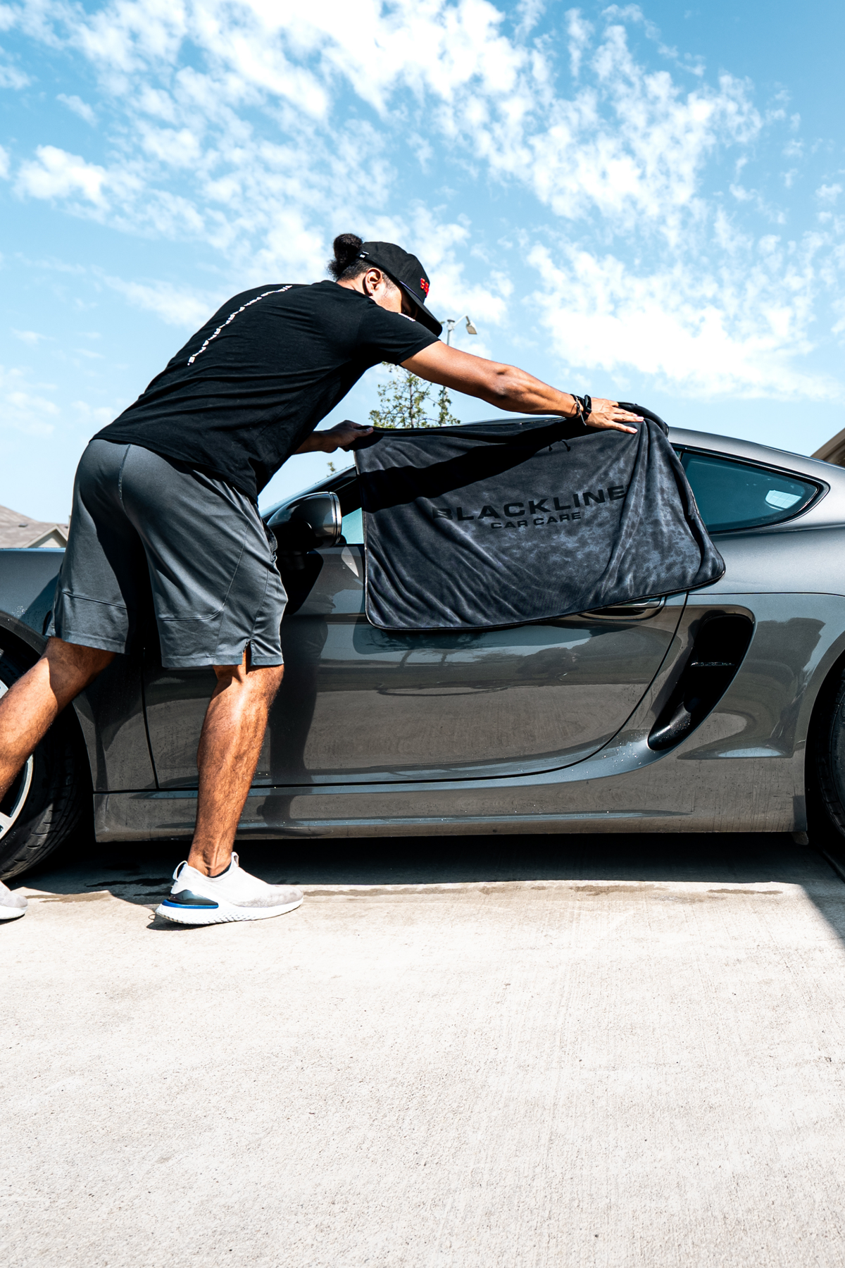 Lifestyle photo of the Blackline slim drying towel in use.