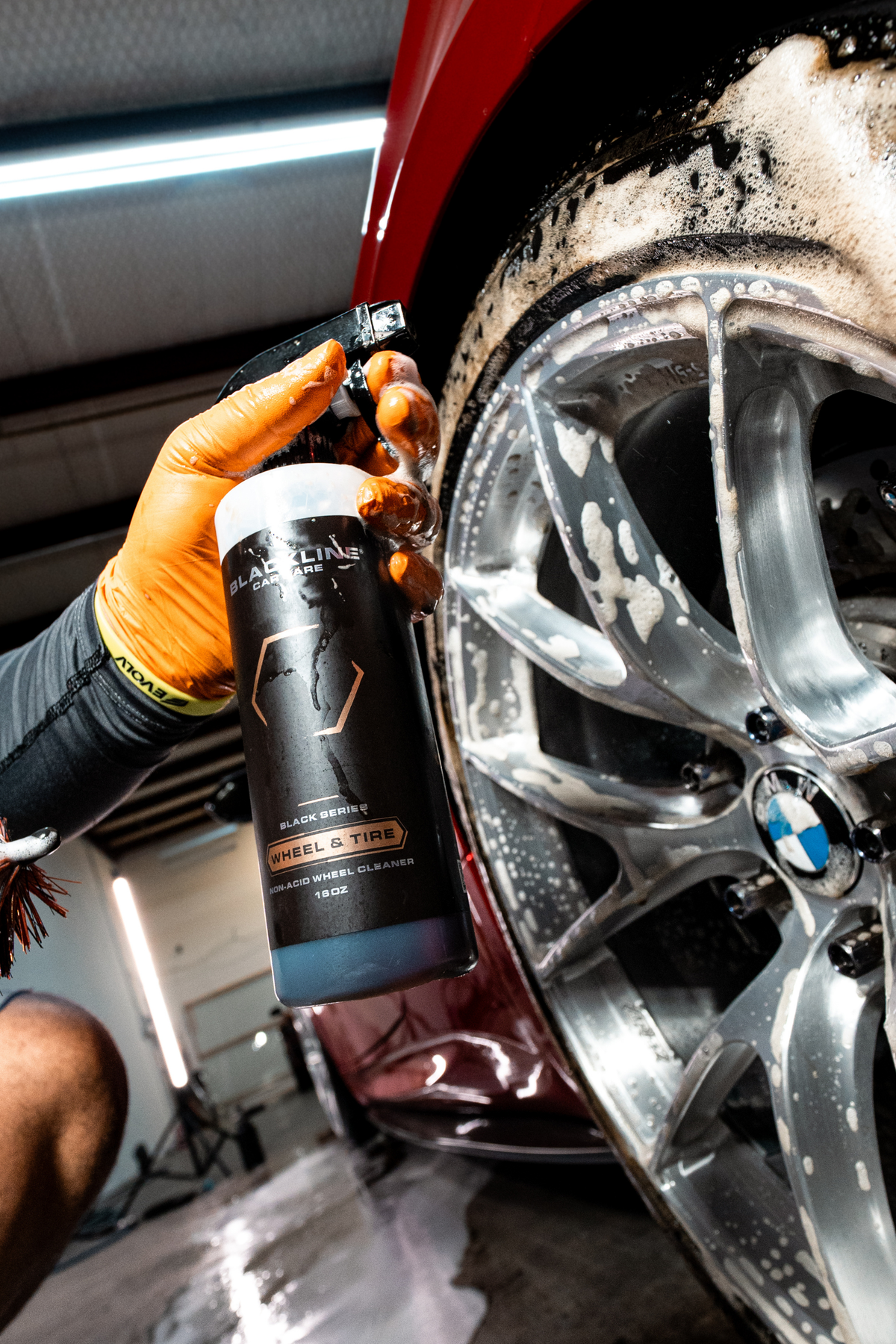 Blackline Wheel n Tire Cleaner reacting purple as it dissolves iron on a wheel.